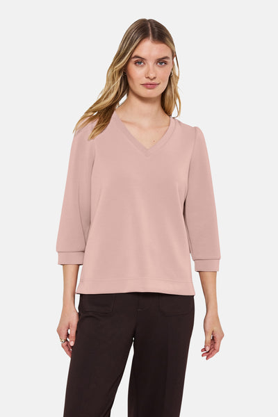Sweatshirt van STREET ONE, driekwartmouwen en een bruine broek met hoge taille.