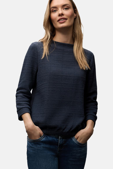 Blauw T-shirt met lange mouwen van Street One, wafelstructuur, gedragen met een casual spijkerbroek.