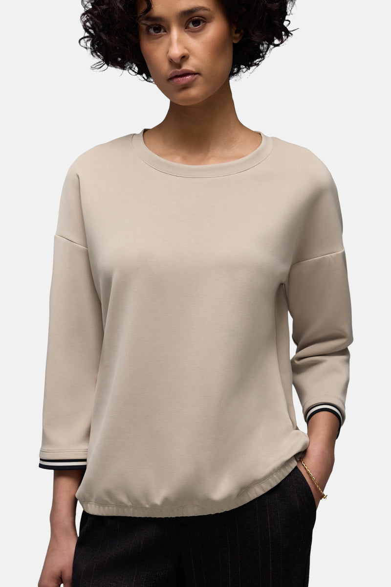 Beige ronde hals sweatshirt van Street One, met driekwart gestreepte mouwen en een zwart gestreepte broek.