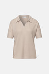 Beige trui van STREET ONE met polokraag en ribgebreide textuur in close-up.