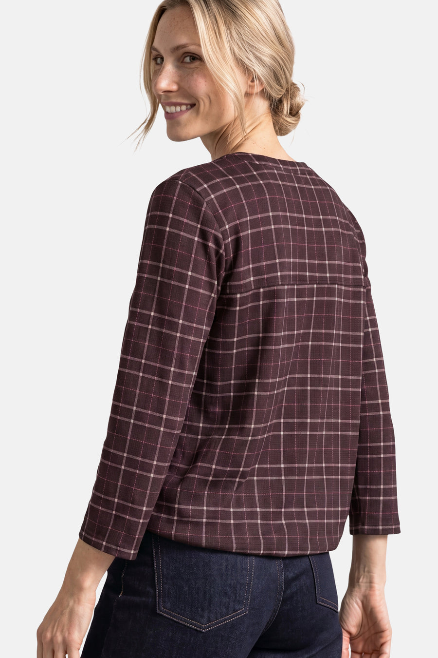 Burgundy checkered blouse with three-quarter sleeves, back view, worn with dark jeans
