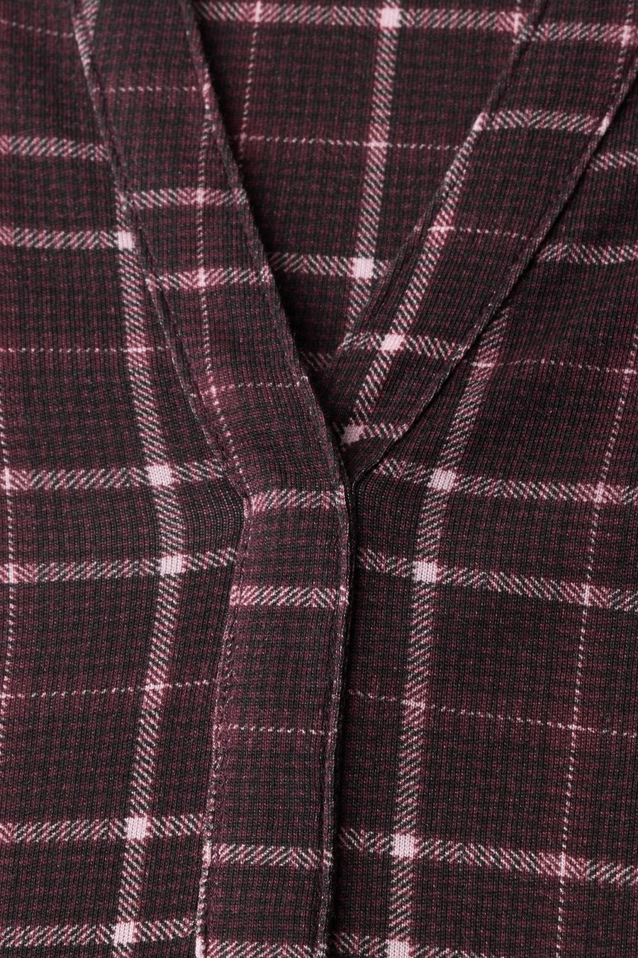 Red 3/4 sleeve blouse with plaid pattern, knit texture, and V-neckline, close-up front view