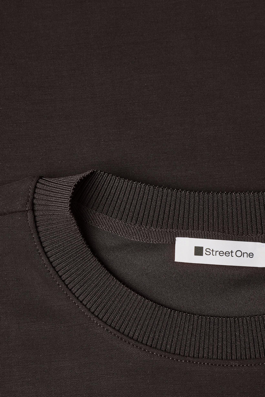 Brown crewneck sweatshirt by Street One, close-up showing ribbed neckline and brand label.