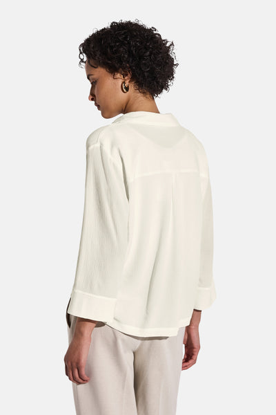 Chemisier blanc (manches longues) de STREET ONE, en tissu texturé, col chemise et coupe décontractée.