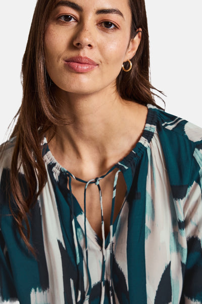 Multikleuren blouse met lange mouwen van Street One, met een abstracte print en decoratieve koorden bij de hals.