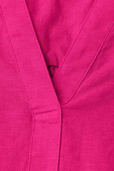 Blouse rose de STREET ONE avec décolleté en V et tissu texturé en gros plan.