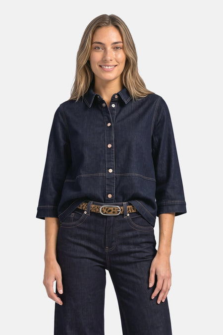 Dark blue denim long-sleeve shirt by STREET ONE, featuring front buttons and rolled cuffs, worn with matching jeans and leopard-print belt in lifestyle front view.