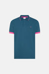 Blauwe polo van SUN 68, met felroze randen aan de kraag en mouwen, en een geborduurd logo.