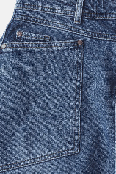 3/4 rok van middinblauw denim van STREET ONE, met achterzakdetail en riemlussen.