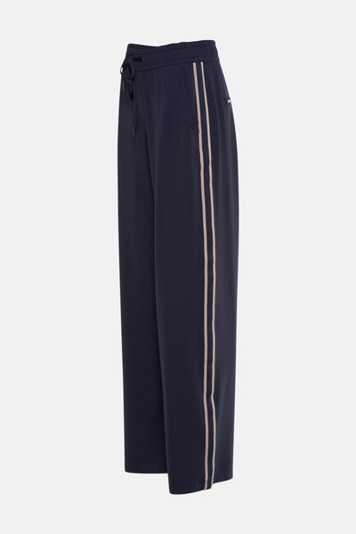 Pantalon bleu de STREET ONE, coupe ample avec rayures contrastantes sur les côtés et cordon de serrage à la taille.