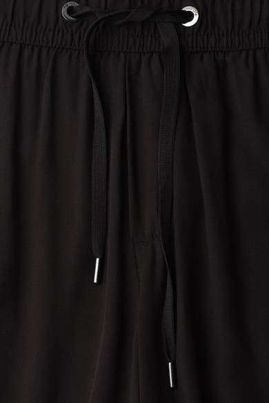 Pantalon noir de STREET ONE avec cordon de serrage et œillet métallique "street one".