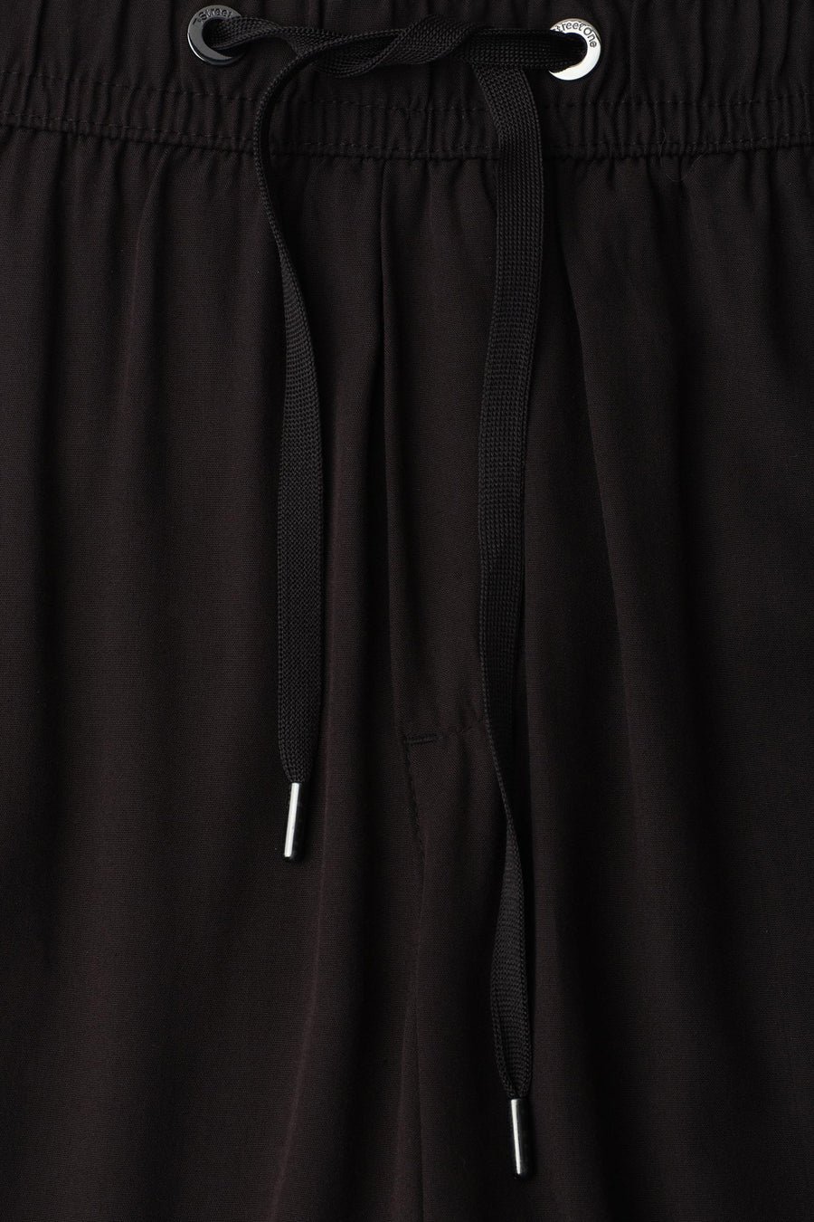 Pantalon noir de STREET ONE avec cordon de serrage et œillet métallique "street one".