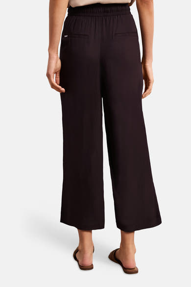 Pantalon brun de STREET ONE, coupe large raccourcie, taille élastique et poches arrière passepoilées, vu de dos.