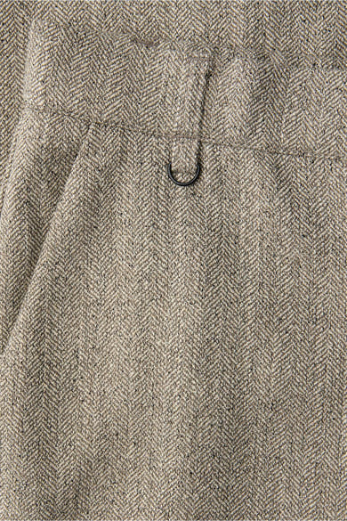 Pantalon de costume beige par Street One, motif à chevrons et détails métalliques.