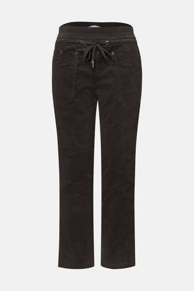 Brown corduroy pants by STREET ONE with elastic waistband, drawstring, and front pockets, shown front view.