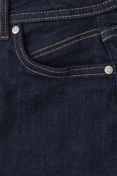 Dark blue denim jeans by STREET ONE, featuring contrast stitching and silver rivets, close-up back pocket view