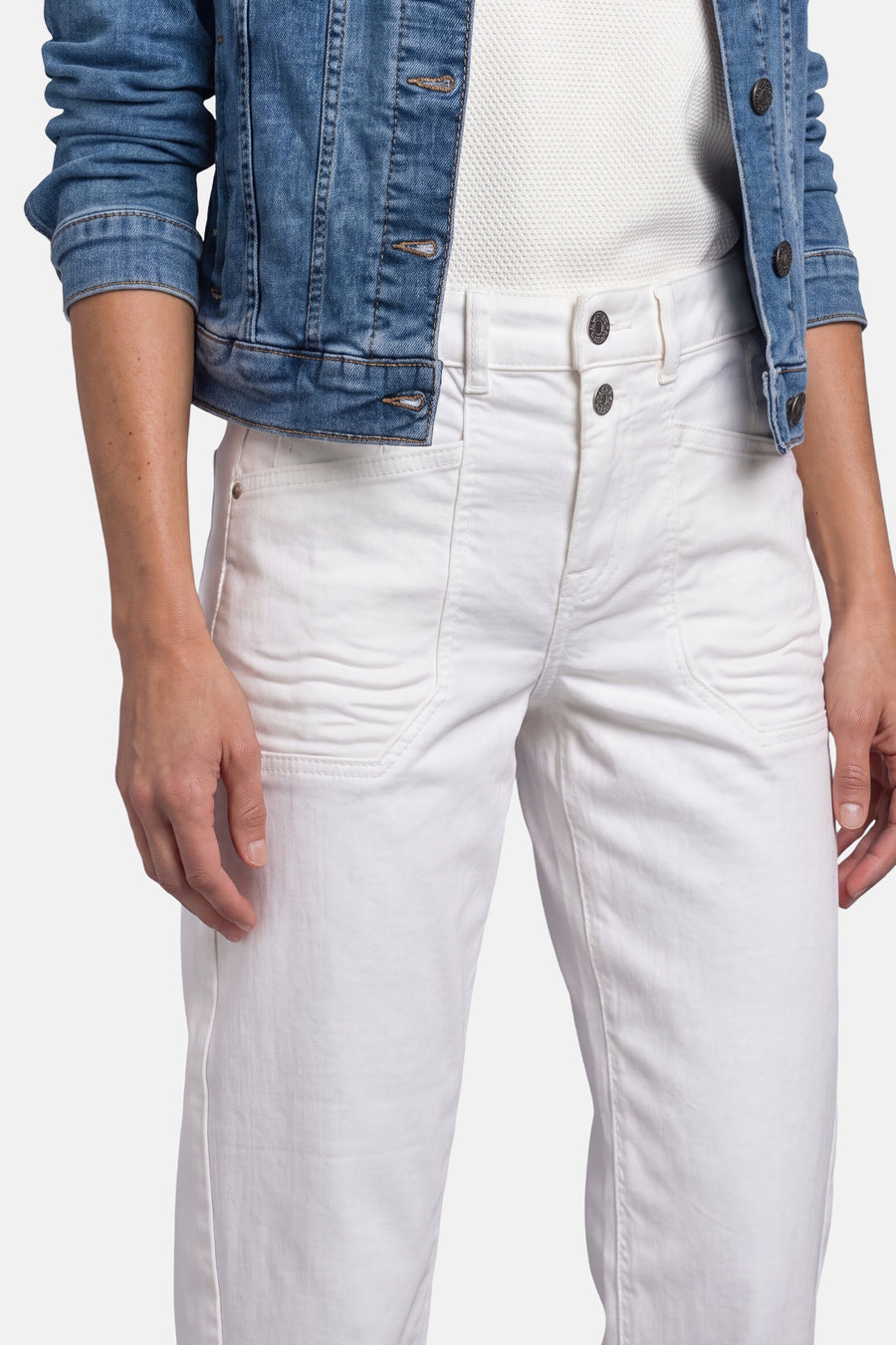 Off-white mom jeans by STREET ONE, featuring classic five-pocket design, button fly, and relaxed fit, shown with denim jacket and white top.