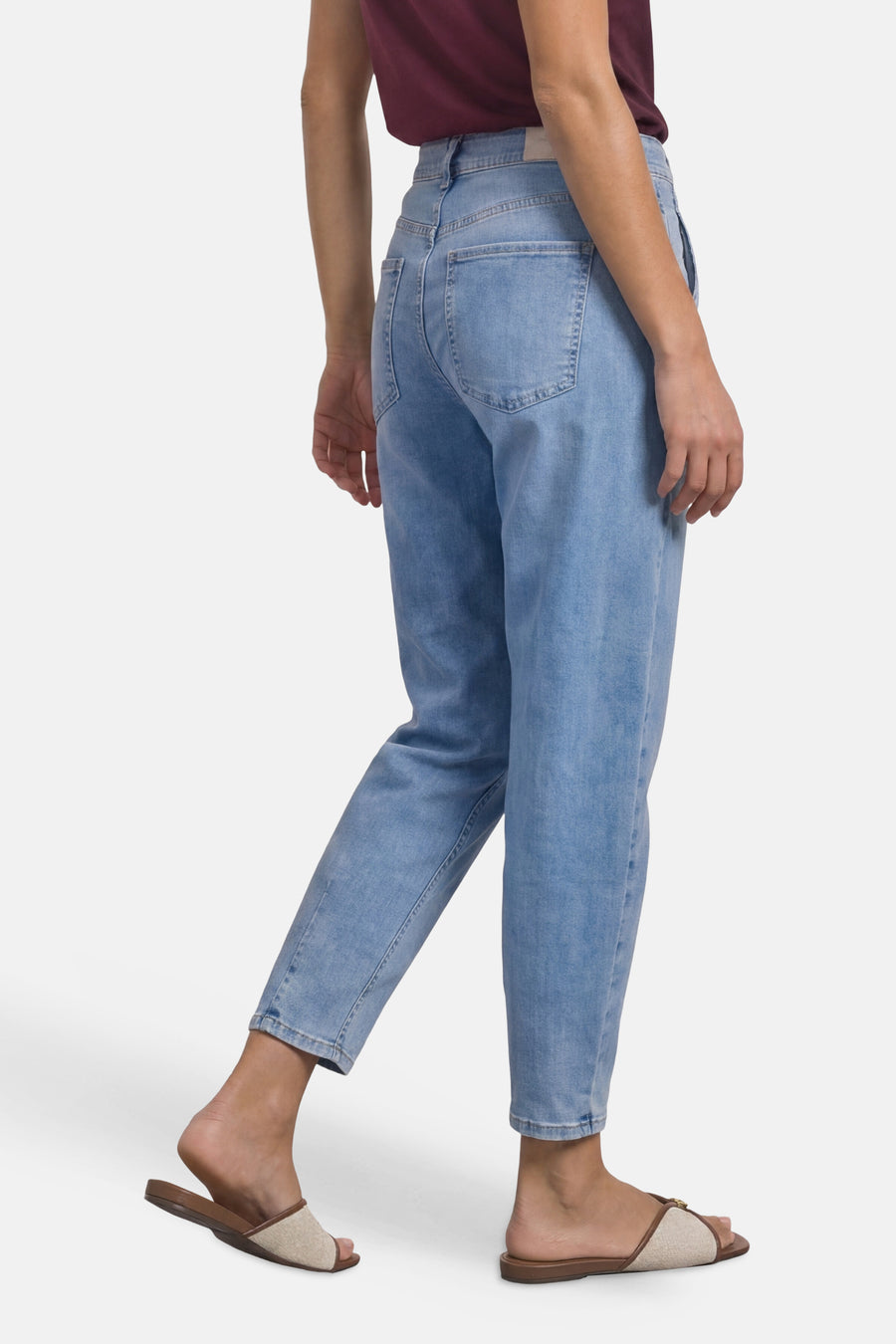 Light blue denim jeans by STREET ONE, back view showing relaxed fit, cuffed hem, and classic stitching details