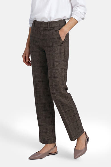 Brown plaid suit trousers by STREET ONE, side view with buttoned front pockets, worn with white blouse and taupe pointed flats.