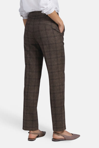 Brown checkered suit trousers by STREET ONE, back view with white blouse and taupe flat sandals