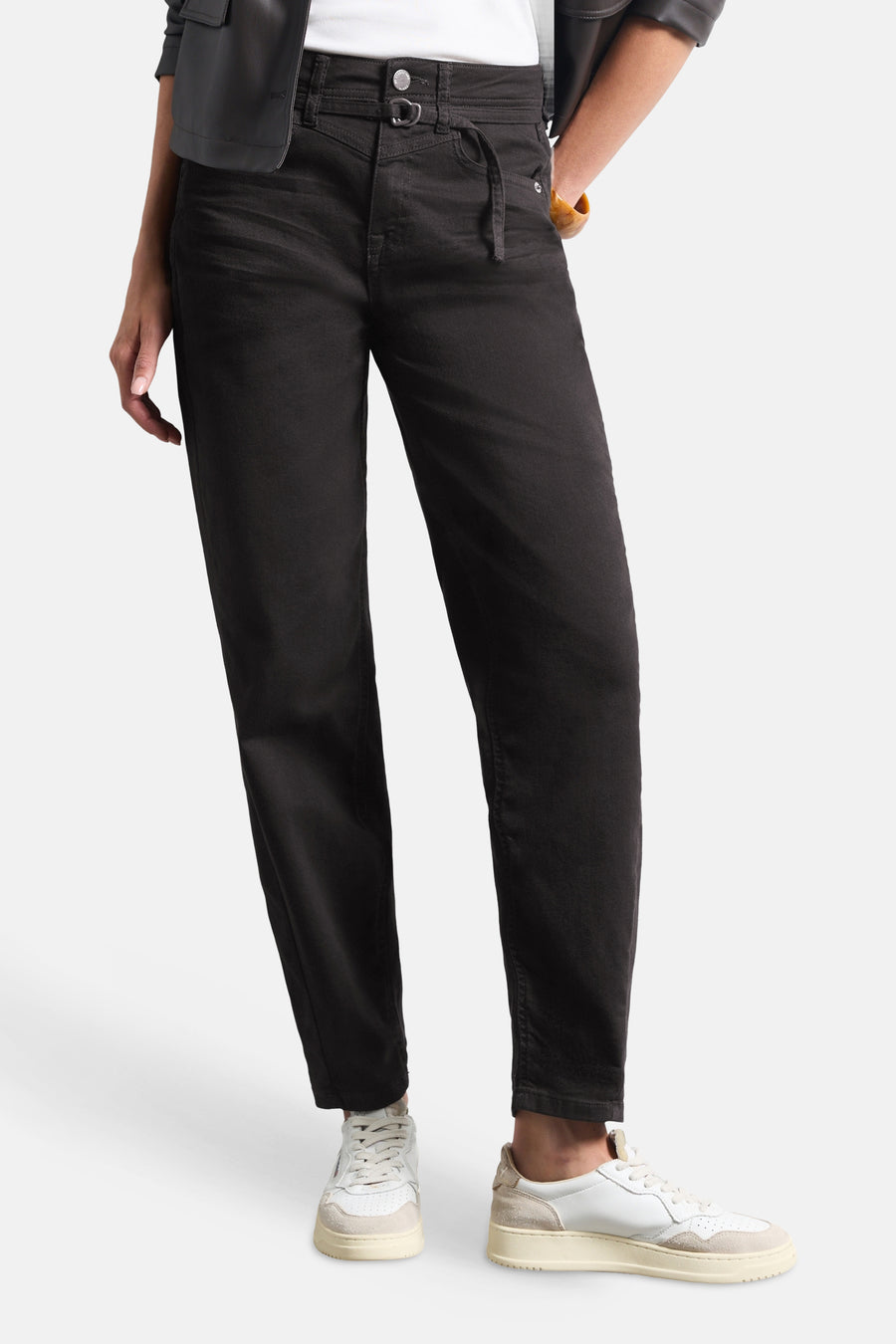 Brown five-pocket seasonal women's pants by STREET ONE, featuring a slim fit with drawstring waist, shown with white sneakers and black jacket.