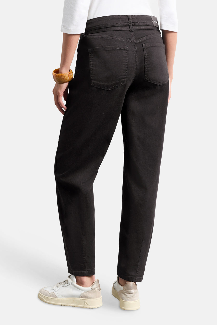 Brown women's 5-pocket seasonal pants by STREET ONE, back view, slim fit with straight legs, worn with white top and sneakers