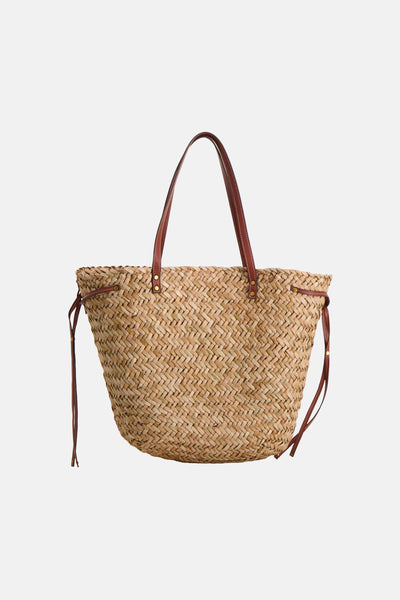 Sac à bandoulière beige en paille tressée de la marque STREET ONE, avec poignées et lanières en cuir marron et détails dorés.