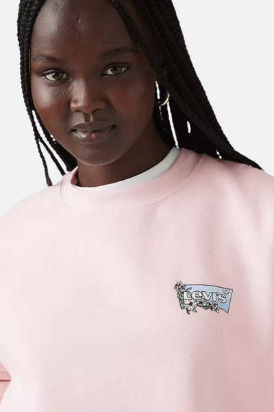 Sweat rose de Levi's, avec un logo floral sur la poitrine et un col ras du cou.