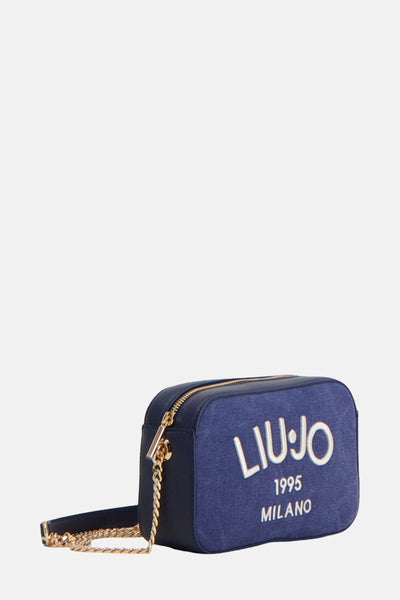Sac à bandoulière bleu de LIU JO avec une bandoulière chaîne dorée, logo et inscription blancs.