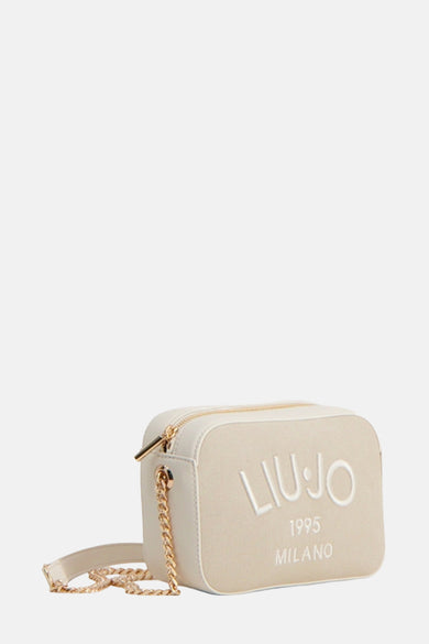 Sac à bandoulière beige de LIU JO avec bandoulière chaîne dorée et logo imprimé.