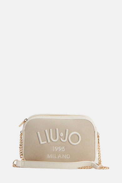 Sac à bandoulière beige de LIU JO avec une bandoulière chaîne dorée et logo en relief.
