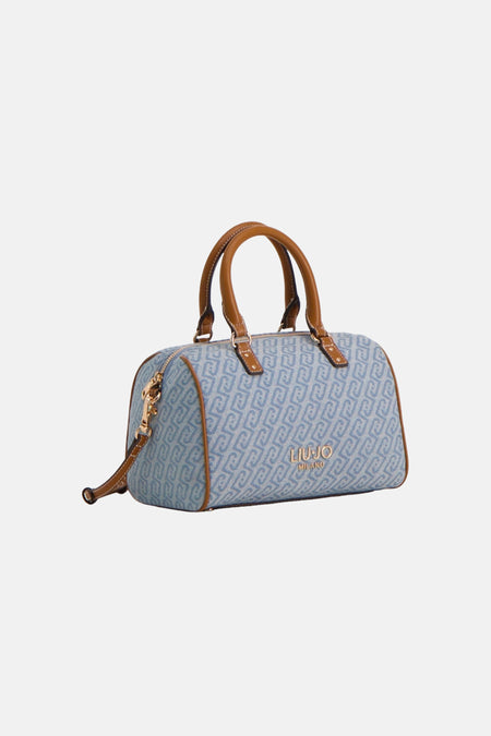 Blauwe handtas met patroon, van LIU JO, met bruine hengsels en gouden ritssluiting.