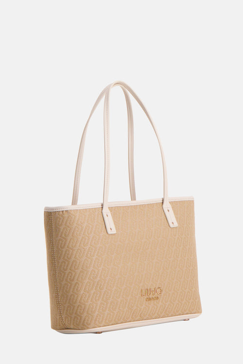 Beige handtas van gemonogramd canvas van LIU JO met ivoorkleurige imitatielederen afwerkingen.