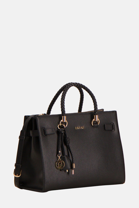 Sac à main noir en similicuir de LIU JO avec poignées tressées et breloque logo.
