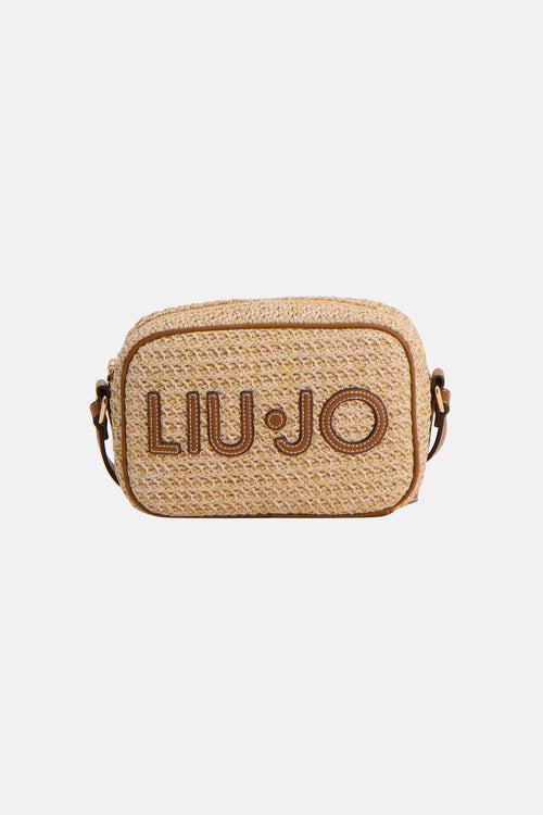 Beige schoudertas van stro van LIU JO, met een bruine schouderriem en het merklogo op de voorkant.