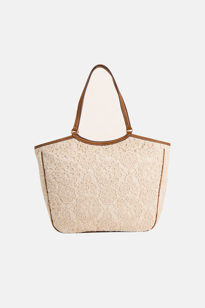 Sac à bandoulière écru de LIU JO, orné de détails en dentelle florale et de finitions marron.
