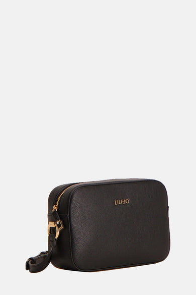 Sac à bandoulière noir de LIU JO avec fermeture éclair dorée et bandoulière attachée.