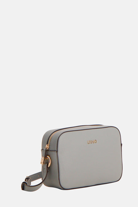 Sac à bandoulière bleu de LIU JO, avec fermeture à glissière dorée et bandoulière réglable.