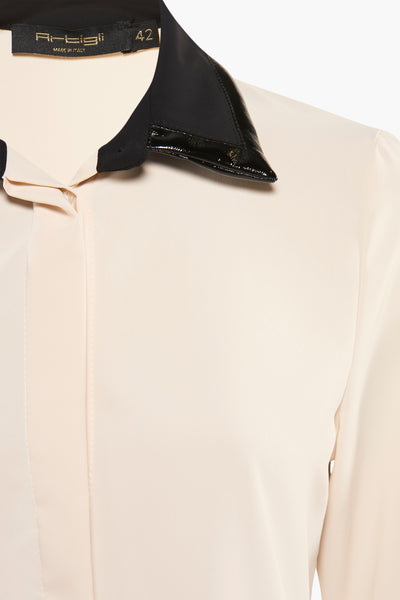 Chemise à manches longues noire de ARTIGLI, col contrastant verni, couleur crème.