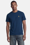 Blauwe T-shirt van STROM met een ronde hals en een geborduurd motief van een bruinend figuurtje op de borst.