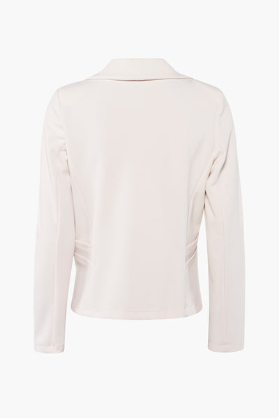 Beige blazer with structured back and side seam detailing, shown from rear view
