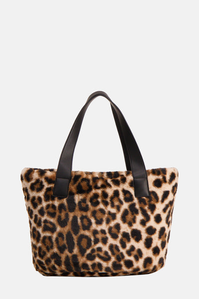 Sac à bandoulière marron en fausse fourrure de LIU JO, avec motif léopard et anses noires.
