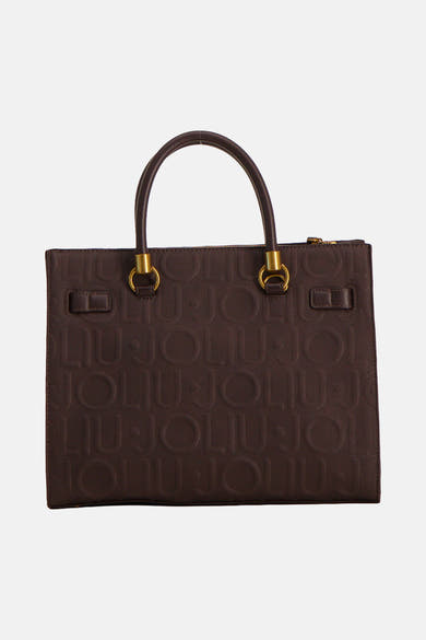 Brown leather handbag with embossed monogram pattern and gold-tone hardware, front view