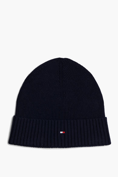 Blauwe muts van TOMMY JEANS met iconisch vlaglogo op de geribbelde omslag.