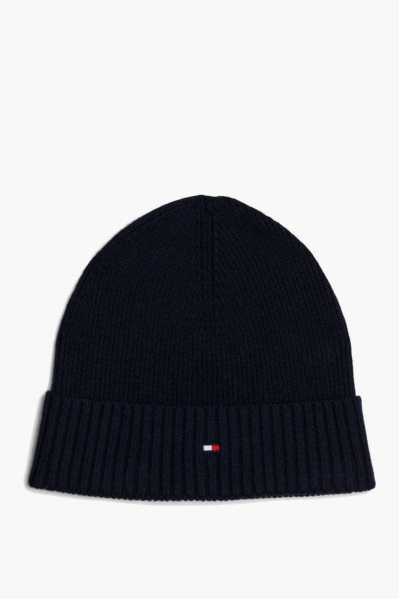 Blauwe muts van TOMMY JEANS met iconisch vlaglogo op de geribbelde omslag.
