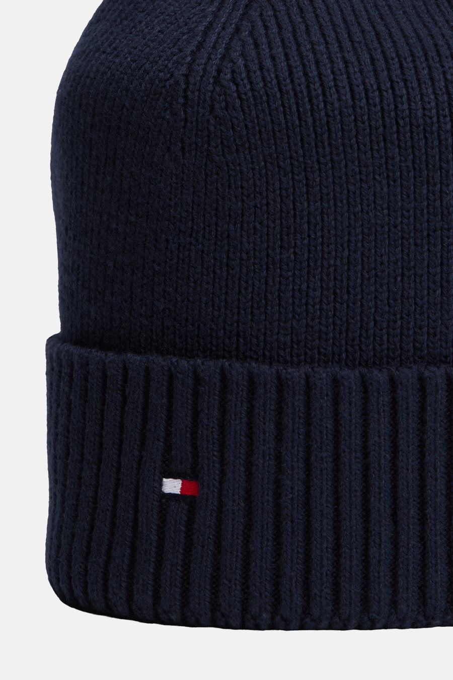 Tommy Jeans blauwe muts, in ribgebreide stof met een klein, kenmerkend rechthoekig logo.