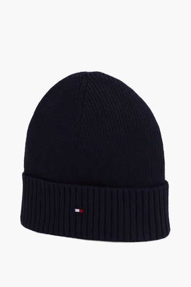 Marineblauwe gebreide muts van Tommy Jeans, versierd met een klein vlaglogo.