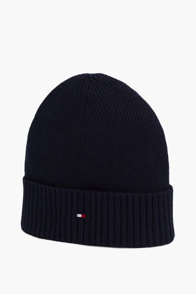 Marineblauwe gebreide muts van Tommy Jeans, versierd met een klein vlaglogo.