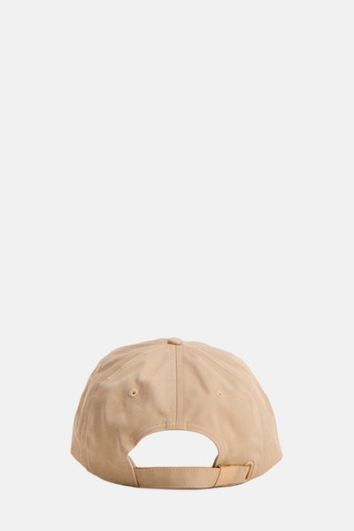 Beige pet van TOMMY JEANS, achterkant, met verstelbare sluiting en ventilatieoogjes.