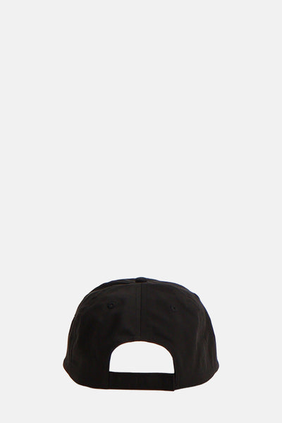 Casquette noire de TOMMY JEANS, vue de dos, avec fermeture réglable et visière subtilement incurvée.